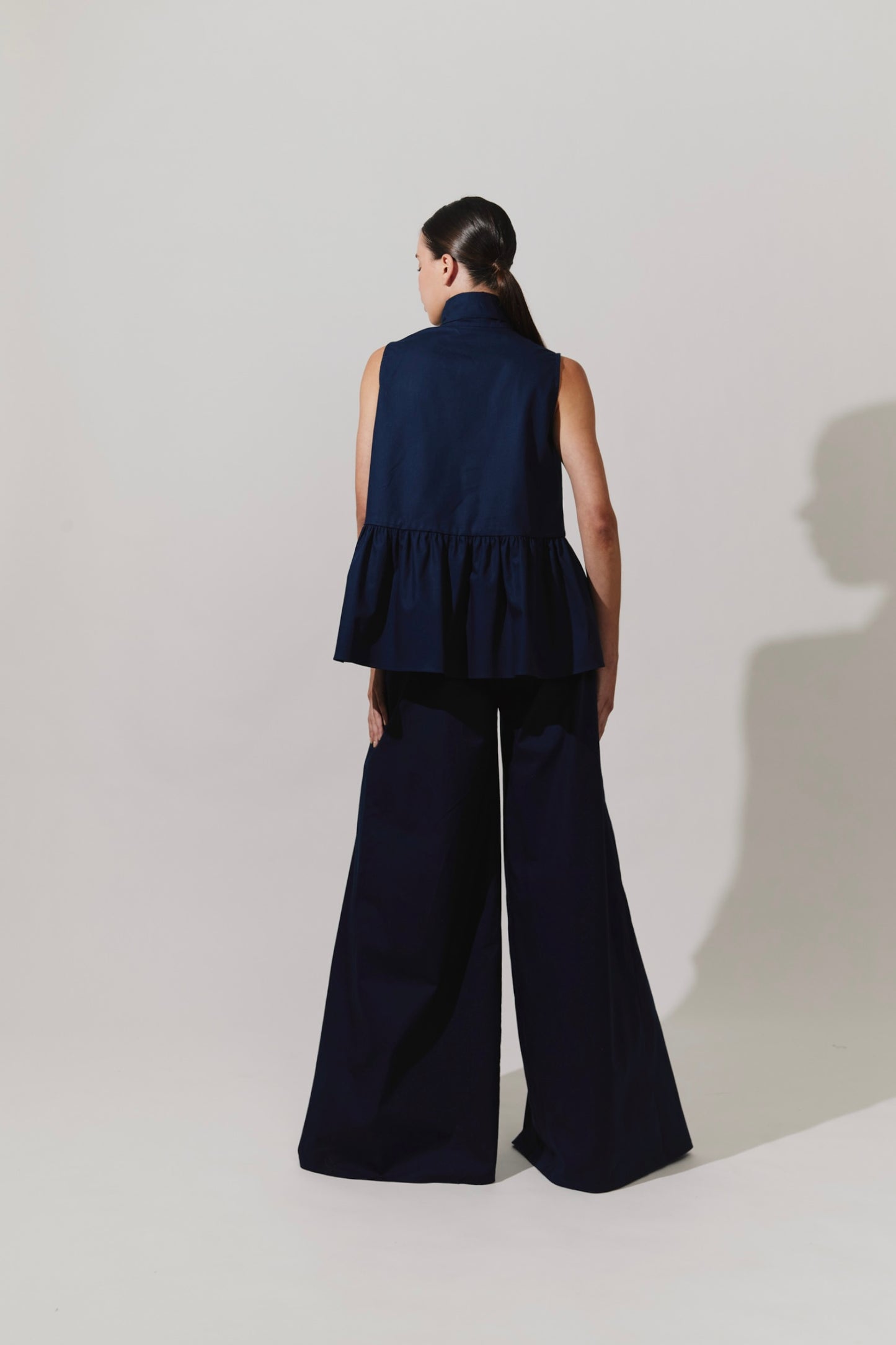 Top peplum con lazada