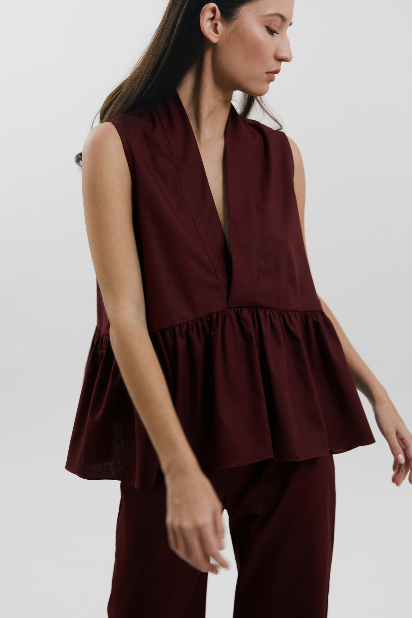 Blusa peplum con escote en V