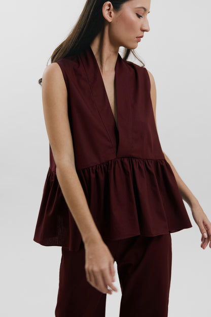 Blusa peplum con escote en V