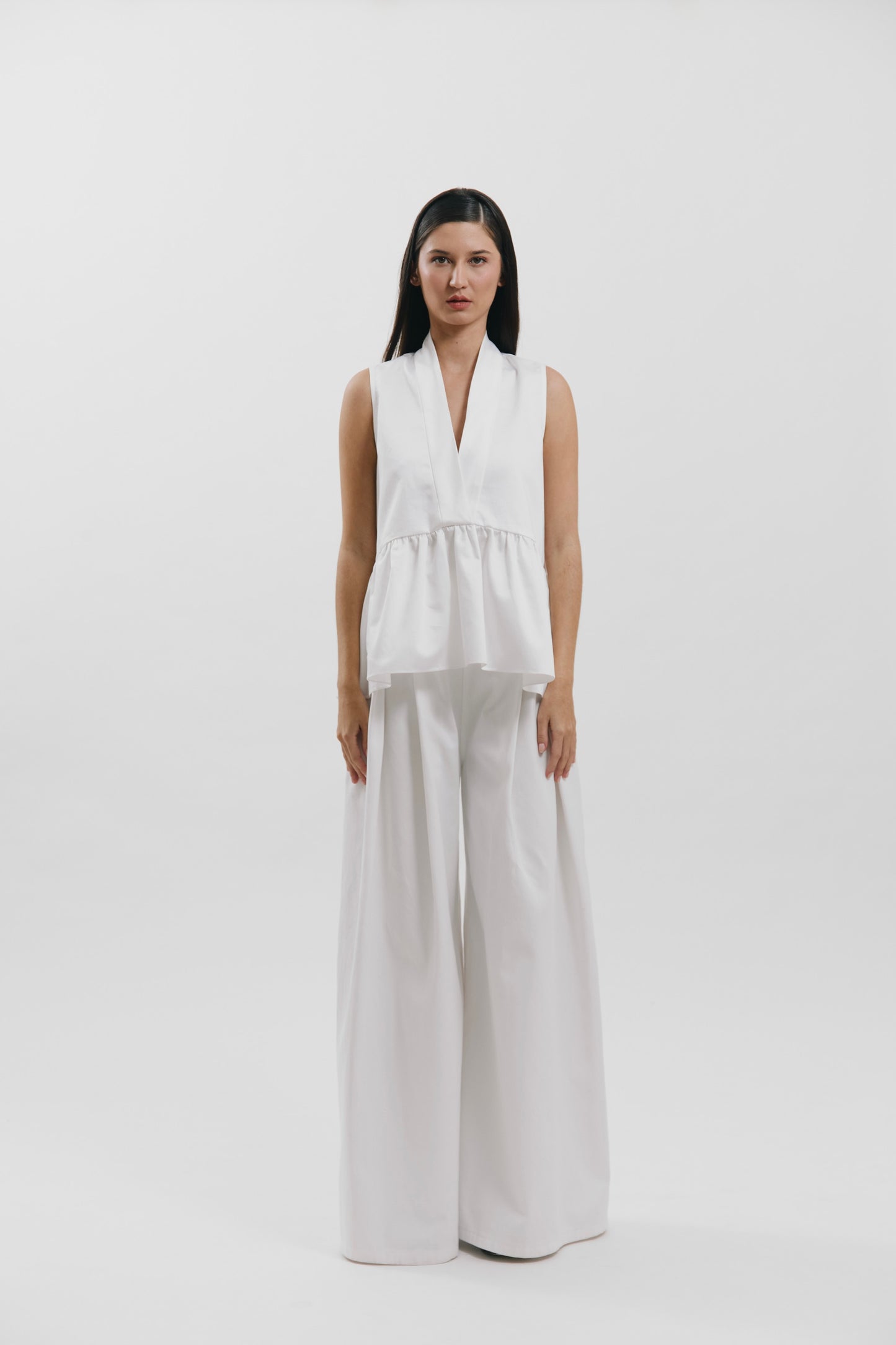 Blusa peplum con escote en V