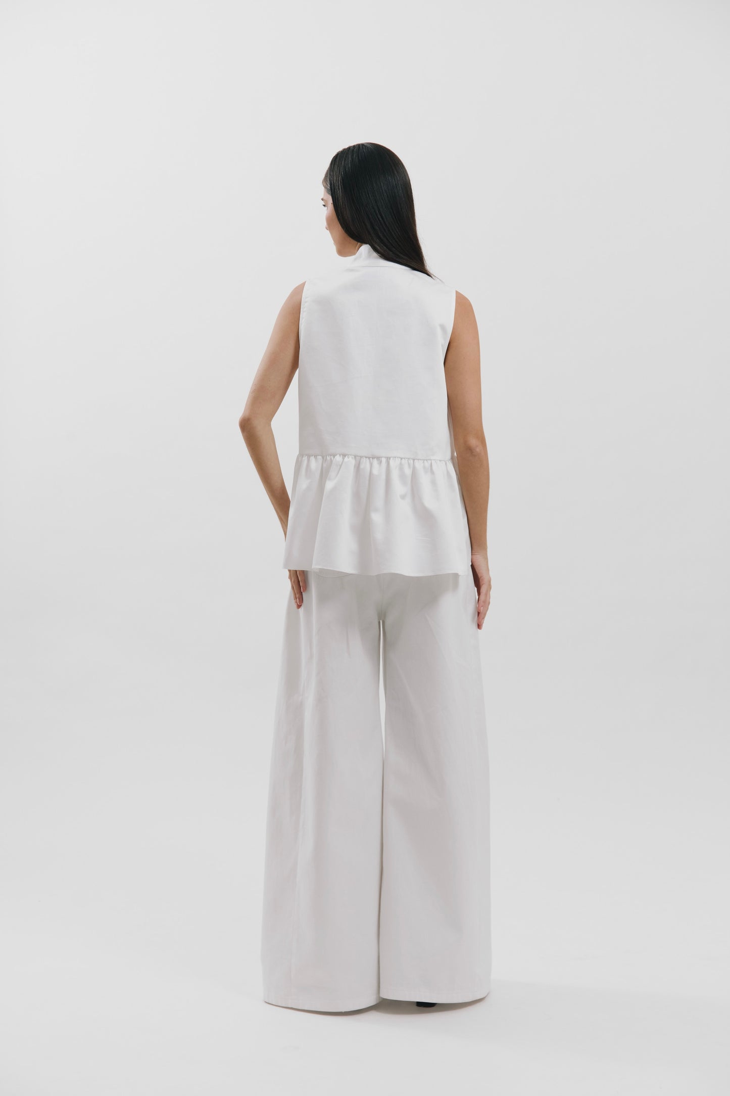 Blusa peplum con escote en V