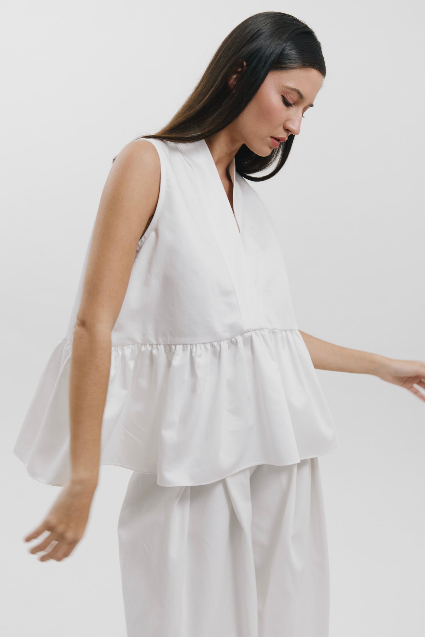 Blusa peplum con escote en V