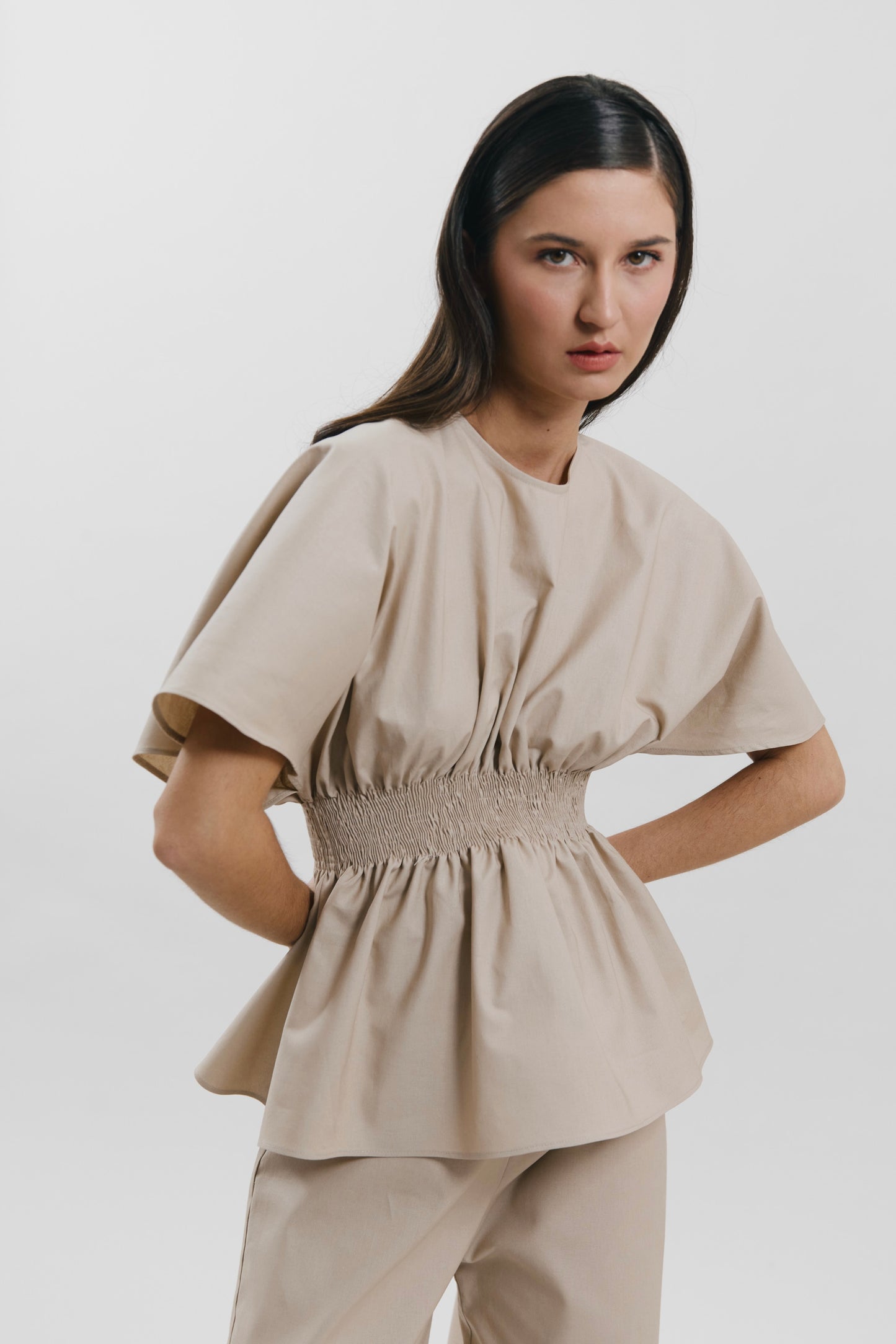 Top con detalle nido de abeja