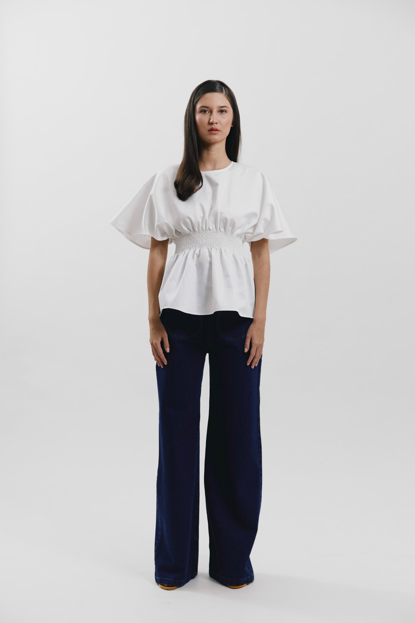 Top con detalle nido de abeja