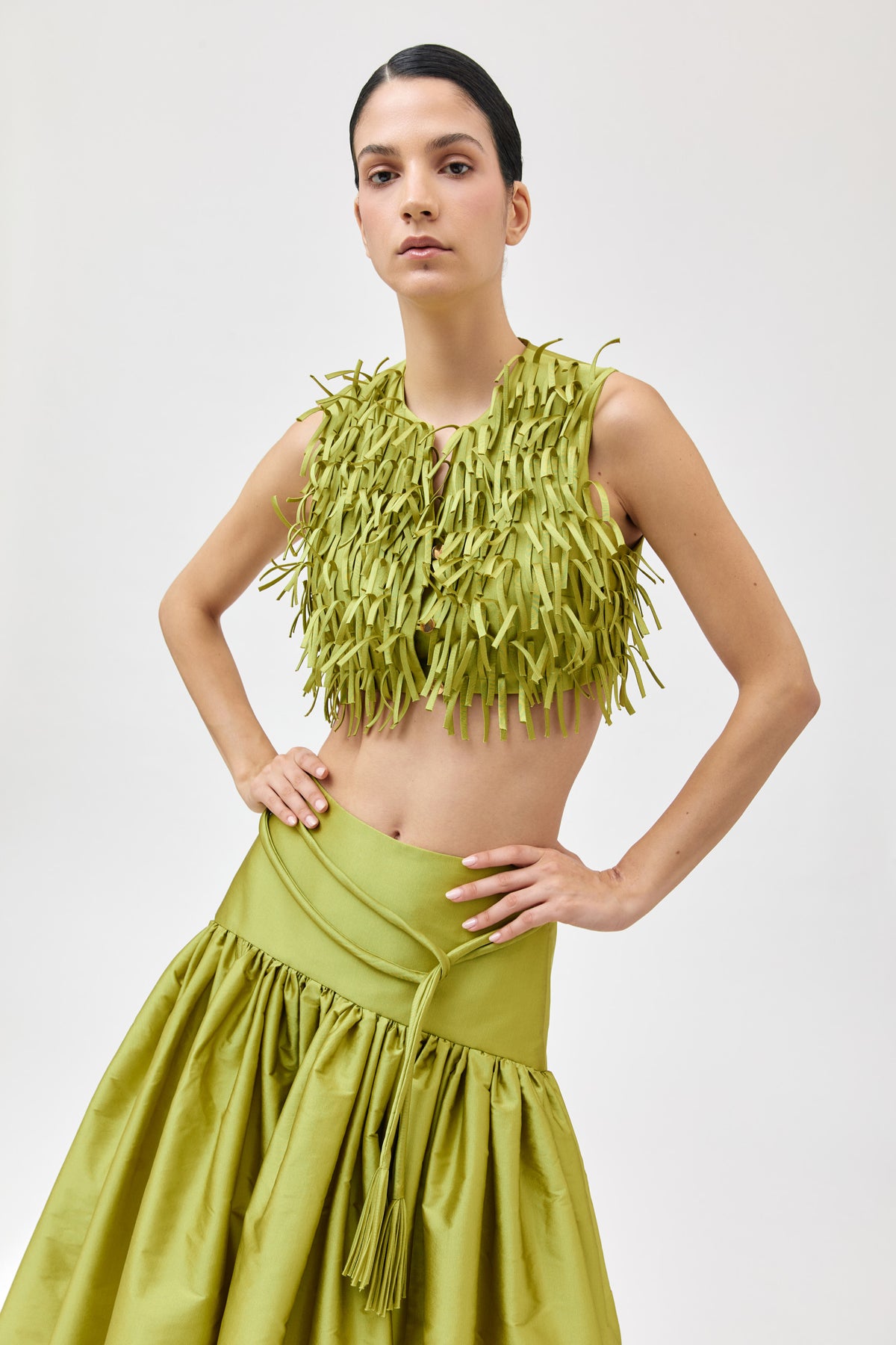Chaleco crop con flecos