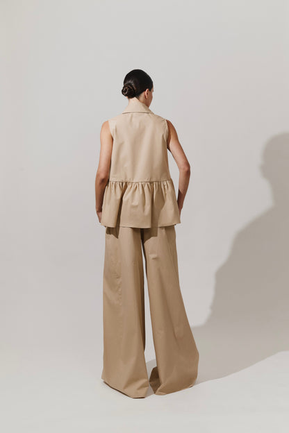 Top peplum con lazada