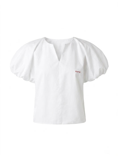 Blusa de mangas abullonadas y cuello en V