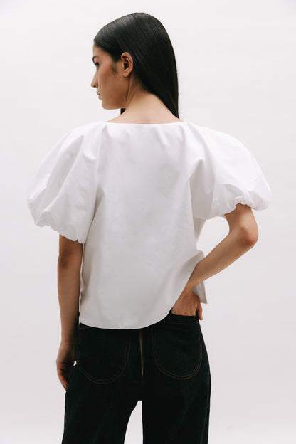 Blusa de mangas abullonadas y cuello en V