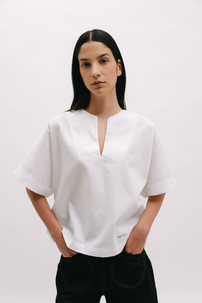 Blusa de mangas cortas con vuelta